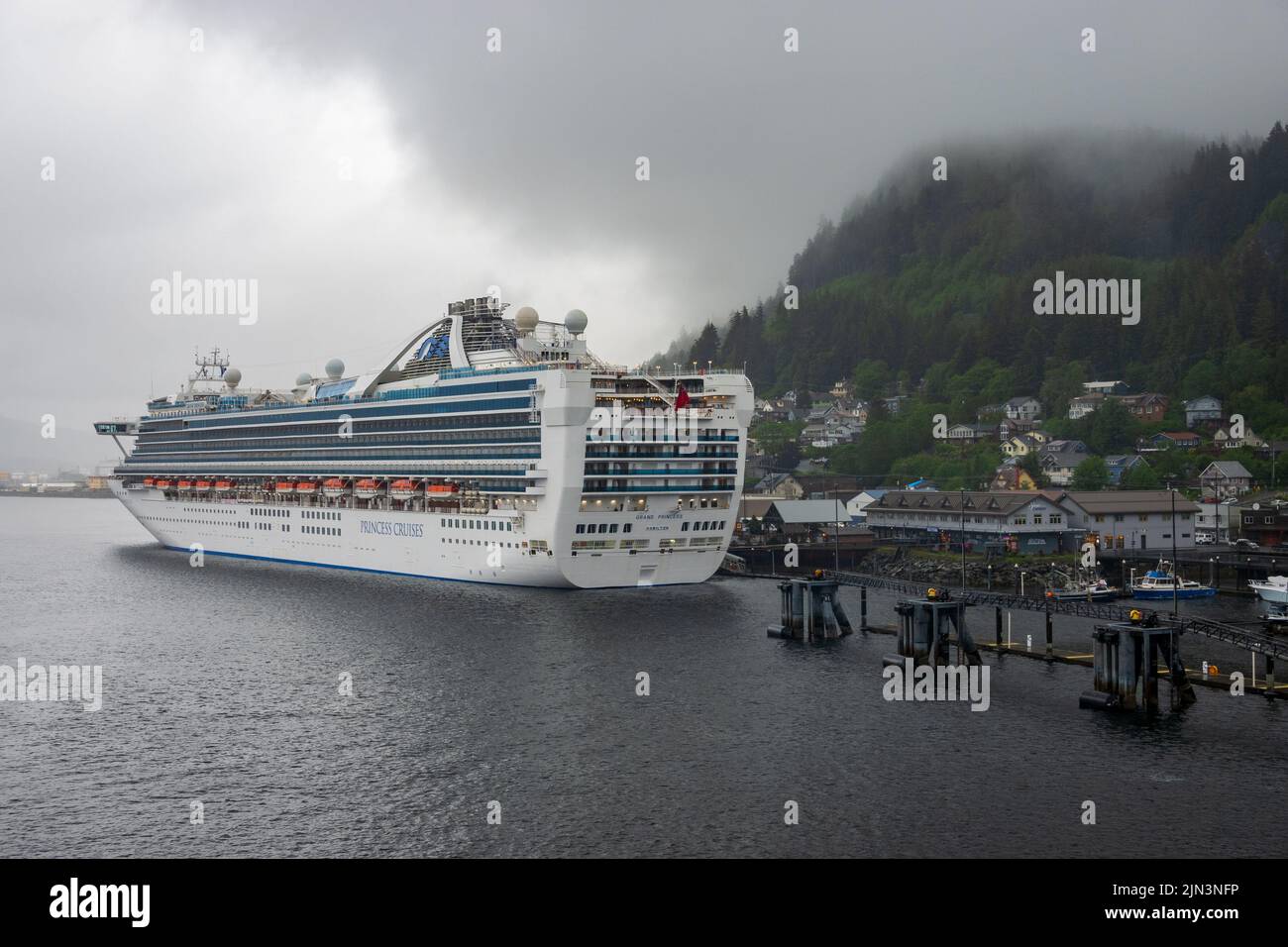 Ketchikan, AK - 10 June 2022: Grand Princess cruise boat docked in Ketchikan Alaska on a typical rainy day Stock Photo