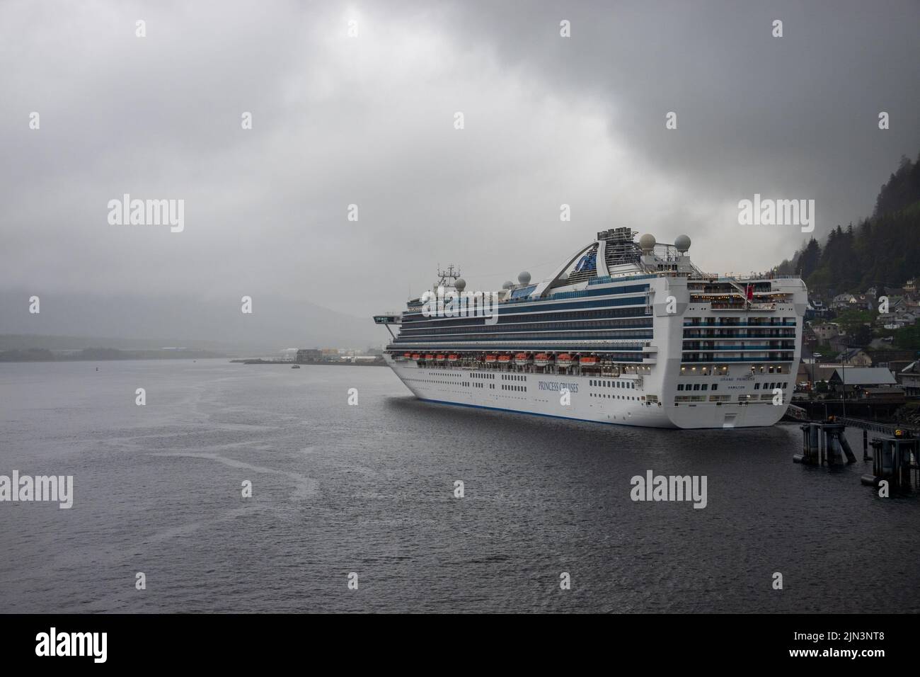 Ketchikan, AK - 10 June 2022: Grand Princess cruise boat docked in Ketchikan Alaska on a typical rainy day Stock Photo