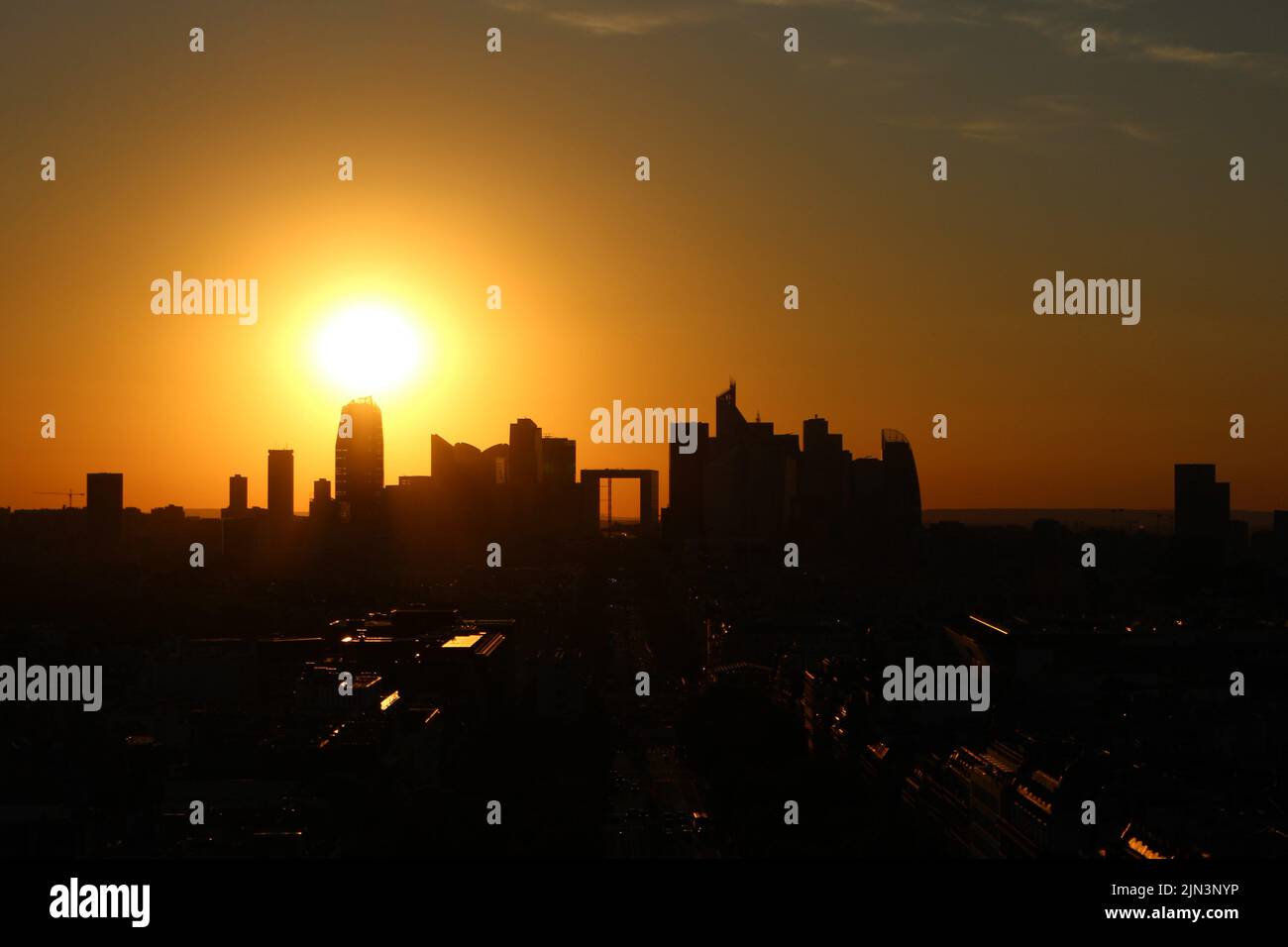 Paris, France. 8th Aug, 2022.Sunset over La Défense, Paris as seen from the top of the Arc de Triomphe Credit: Aldercy Carling/ Alamy Live News Stock Photo