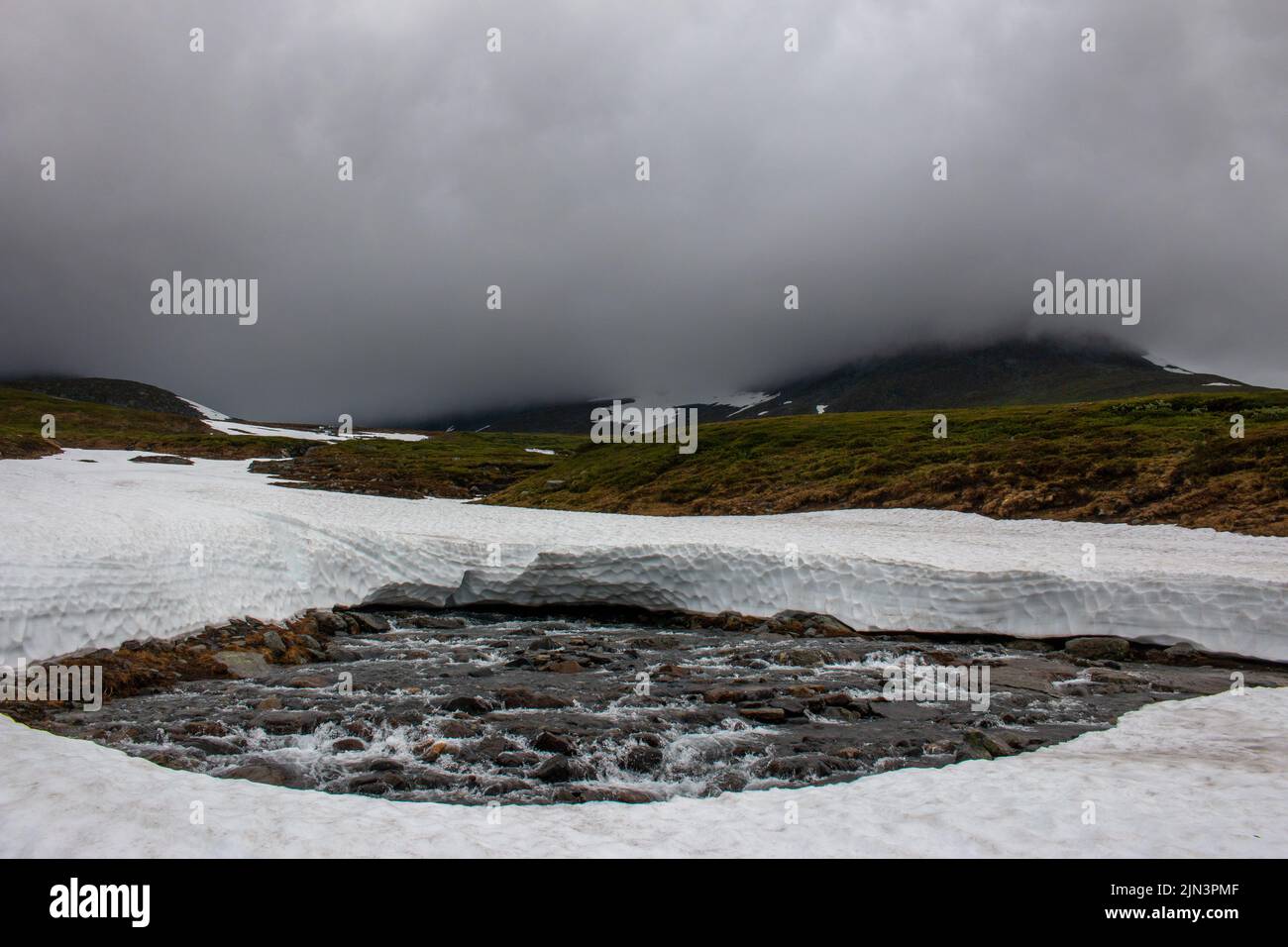 Melting snow in Sylarna Mountains between Sweden and Norway, early July Stock Photo