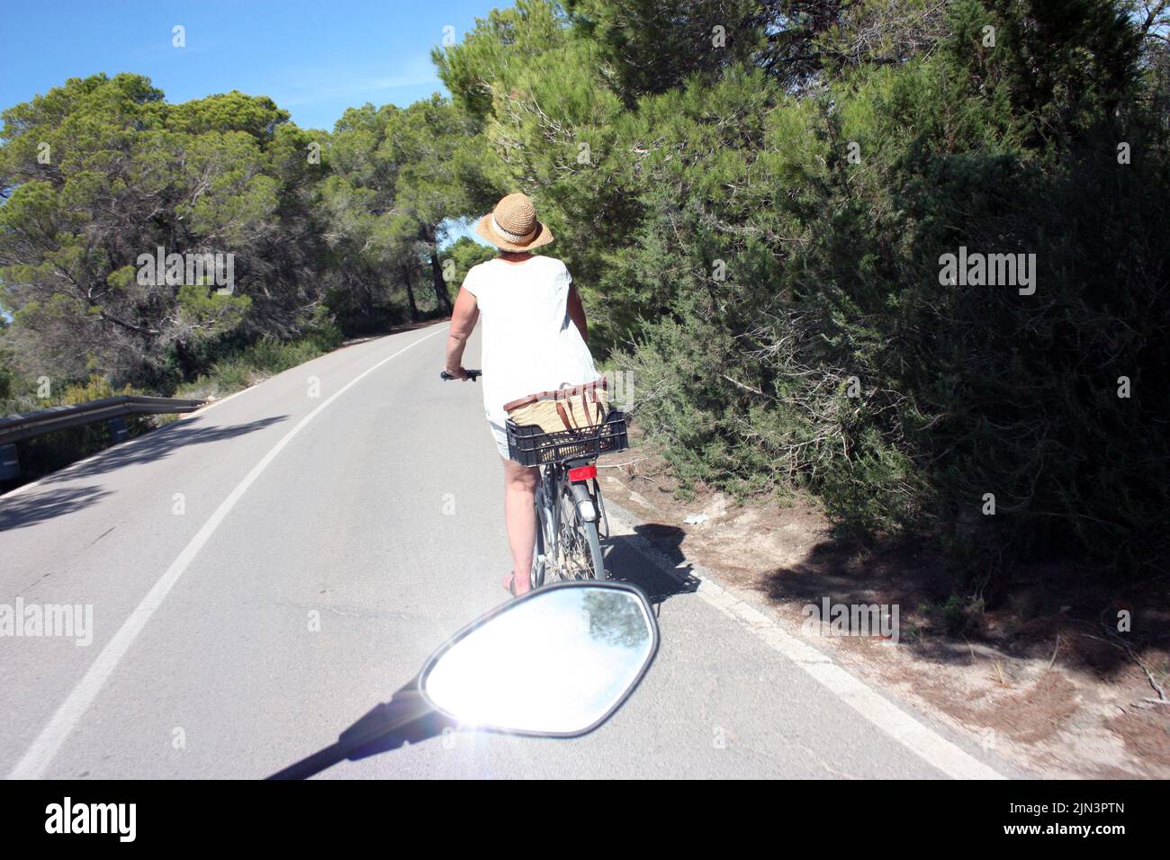 bicycle scooter chase of a tourist wandering around the streets of in the summer holidays