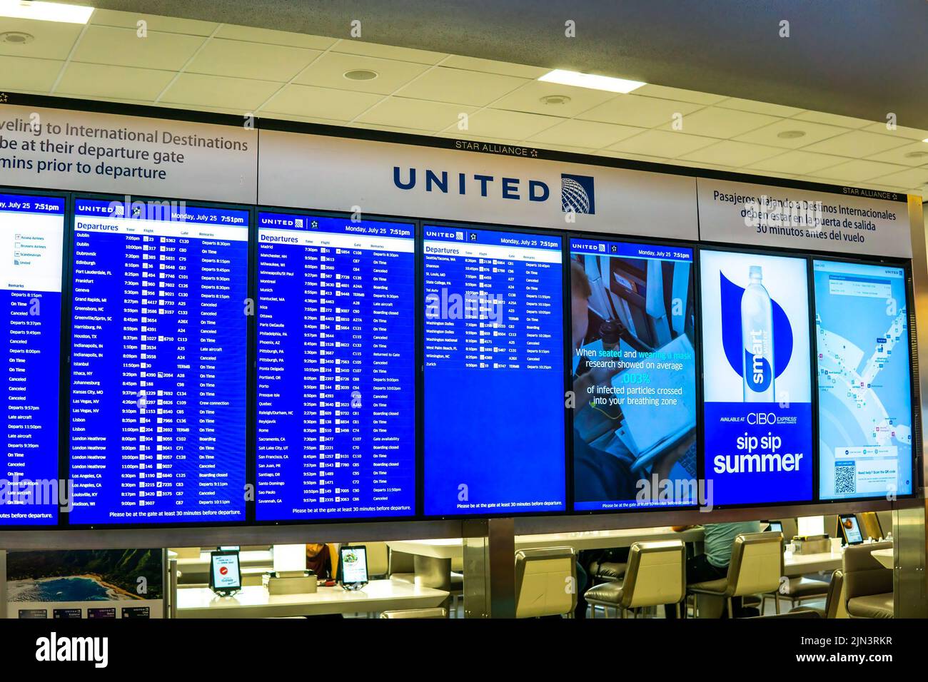 Newark, NJ - USA - July 25, 2022 Landscape interior view of an airport departure board for United Airlines flights leaving United Airlines Terminal C Stock Photo