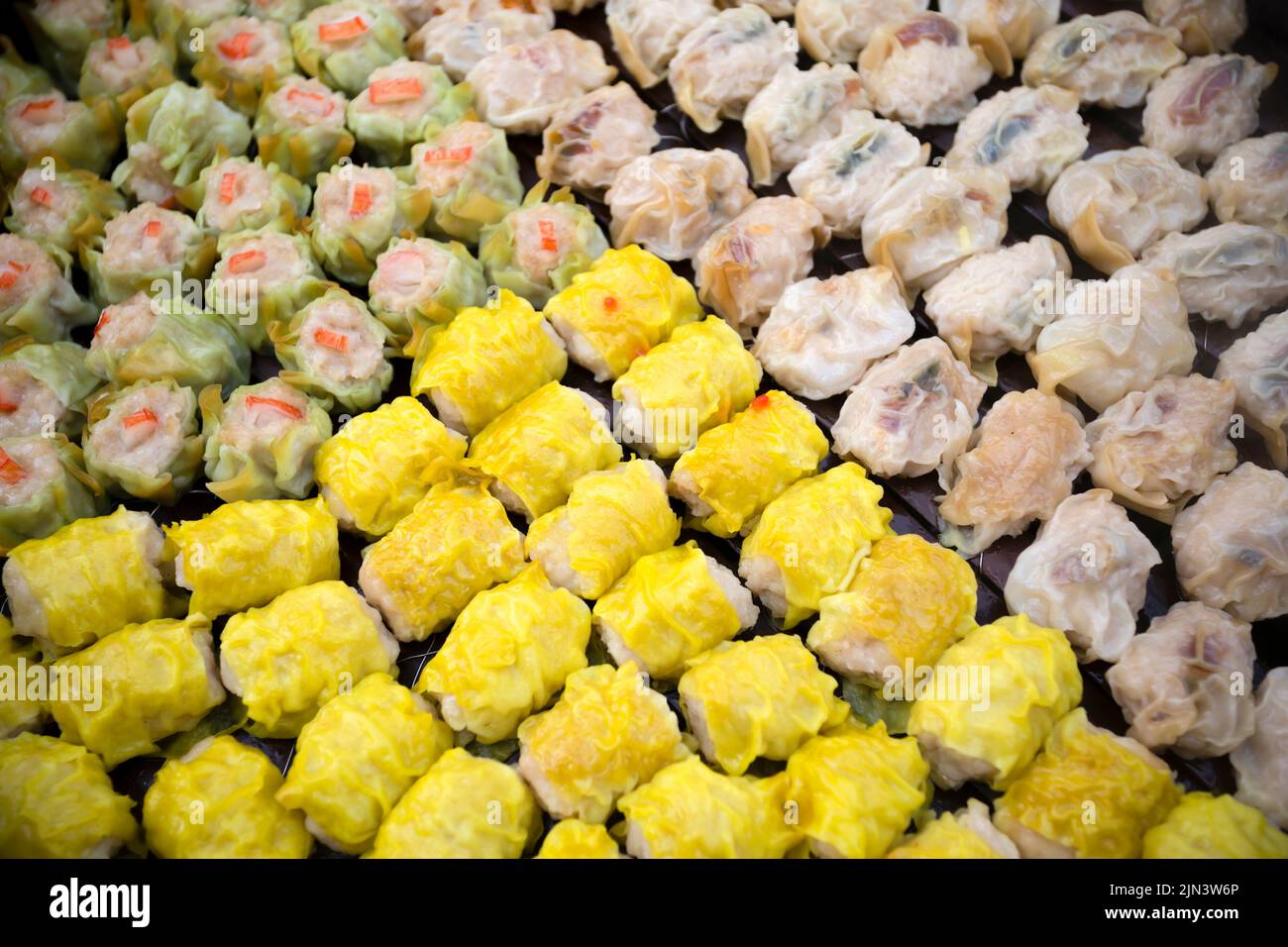 Shumai is a type of traditional Chinese dumpling. In Cantonese cuisine, it is usually served as a dim sum snack Stock Photo