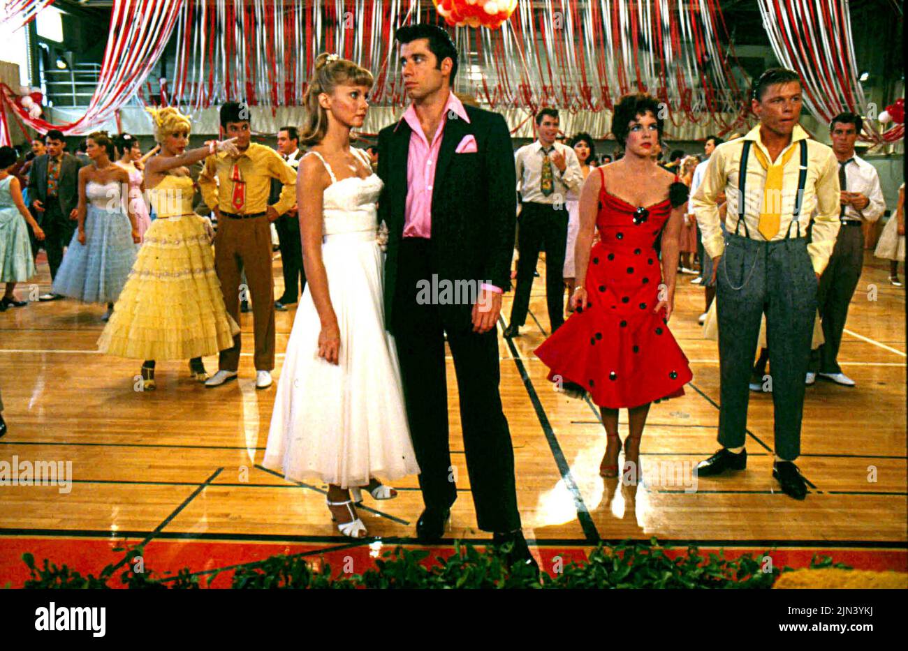 1977 - Hollywood, California, U.S. - Actors OLIVIA NEWTON JOHN with JOHN TRAVOLTA during a dance scene while filming of the movie 'GREASE' in 1977. (Credit Image: © Phil Roach/Globe Photos via ZUMA Wire) Stock Photo