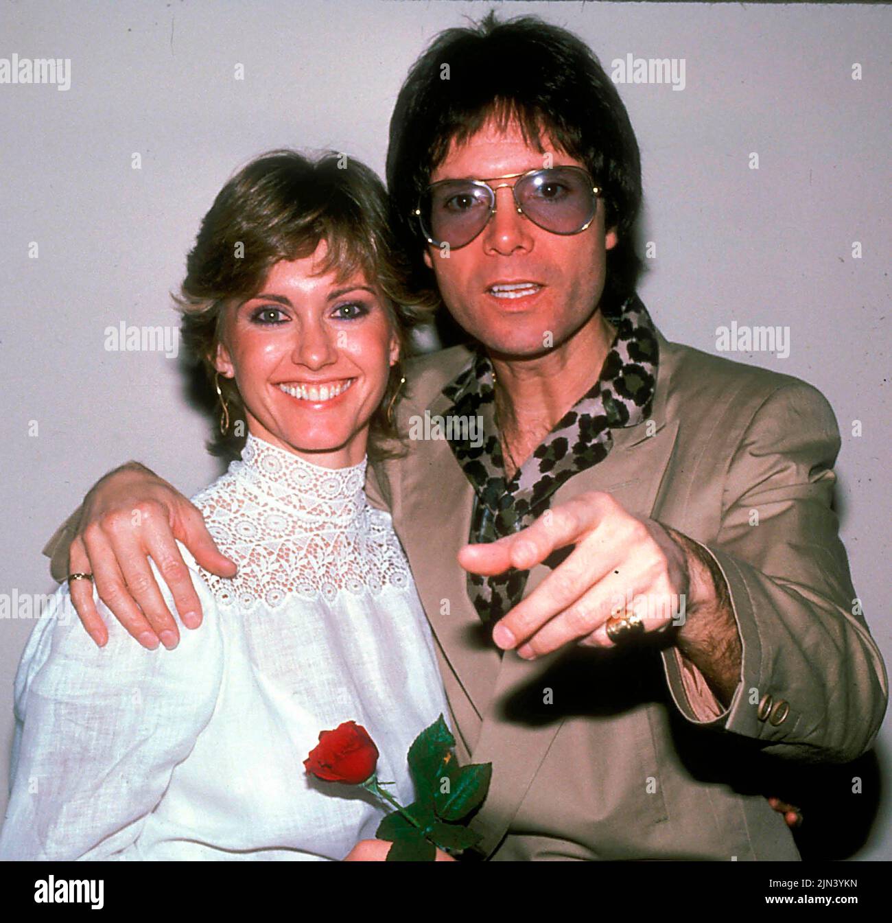 Circa 1983, London, England, United Kingdom: Singers OLIVIA NEWTON JOHN and CLIFF RICHARD. 'Suddenly' is a duet performed by Olivia Newton-John and Cliff Richard from the soundtrack 'Xanadu,' and is the love theme from the 1980 film of the same name. (Credit Image: © Globe Photos via ZUMA Wire) Stock Photo