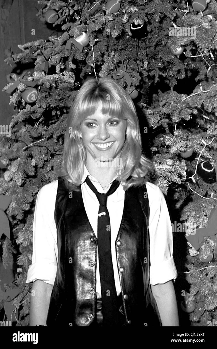 Circa 1985 - London, England, United Kingdom - British/Australian singer and actress OLIVIA NEWTON JOHN wearing a black tie and leather waist coat. (Credit Image: © Globe Photos via ZUMA Wire) Stock Photo