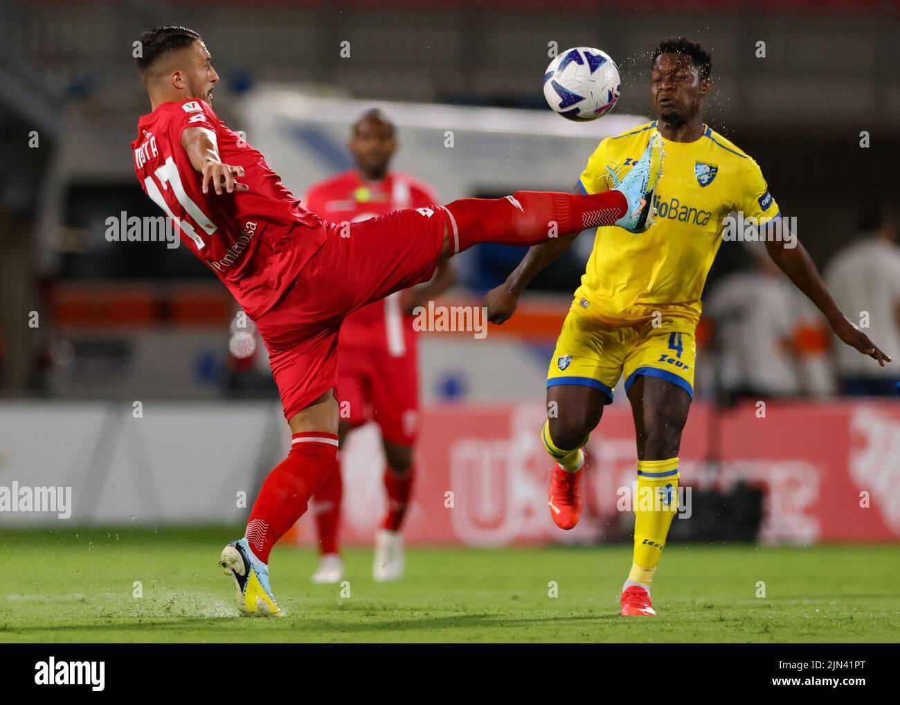 Monza, Italy, 7th August 2022. Dani Mota Carvalho of AC Monza controls the ball as Ben Kone of Frosinone Calcio closes in during the Coppa Italia match at U-Power Stadium, Monza. Picture credit should read: Jonathan Moscrop / Sportimage Stock Photo