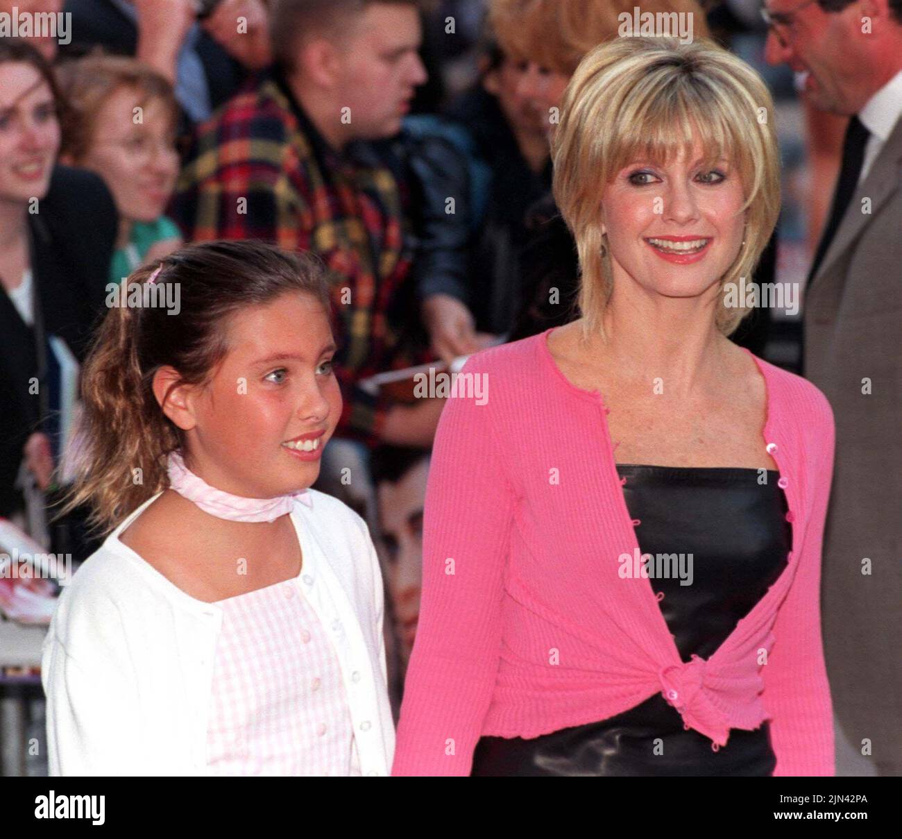 File photo dated 25/06/98 of Olivia Newton-John arrives with her daughter Chloe, for the premiere of the 20th anniversary re-issue of the musical Grease, at the Empire, Leicester Square, London. Dame Olivia Newton-John has died at the age of 73, her widower has confirmed. The British-born singer died "peacefully" at her ranch in Southern California on Monday morning, surrounded by family and friends. Issue date: Tuesday August 9, 2022. Stock Photo