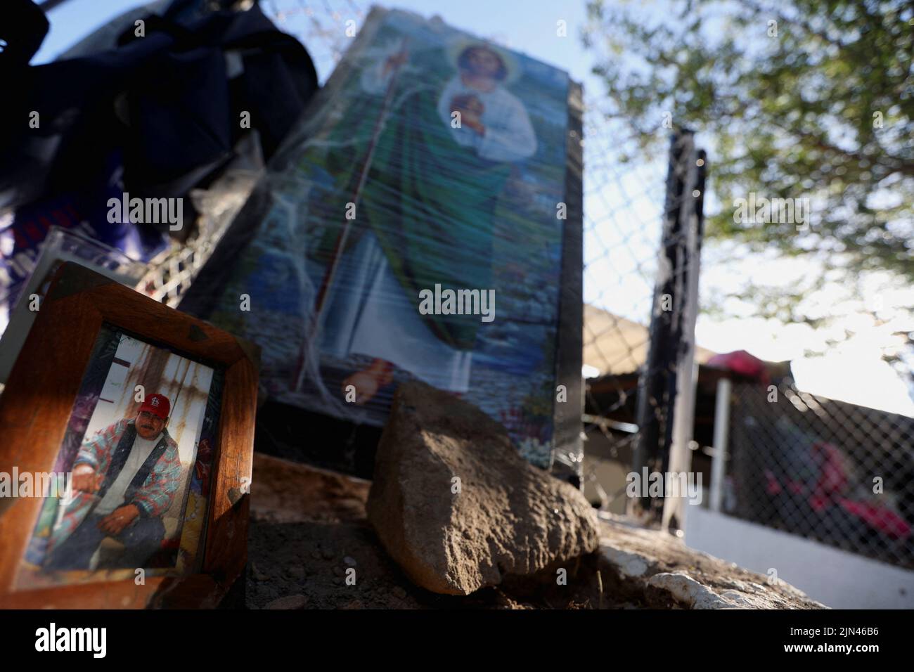 An altar made by relatives of Jaime Montelongo Perez, one of the trapped miners, sits outside the facilities of a coal mine where a mine shaft collapsed leaving miners trapped, in Sabinas, Coahuila state, Mexico, August 8, 2022. REUTERS/Luis Cortes Stock Photo