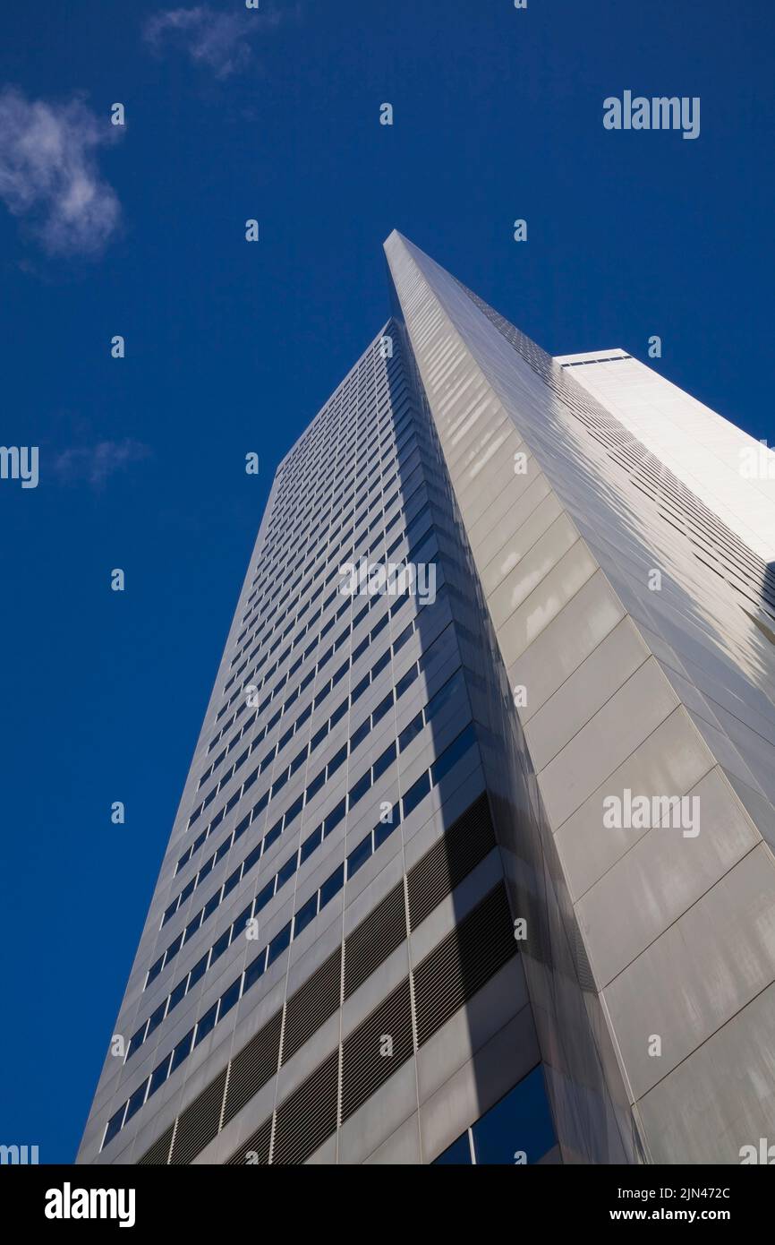 Modern architectural office tower against a blue sky background, Montreal, Quebec, Canada Stock Photo