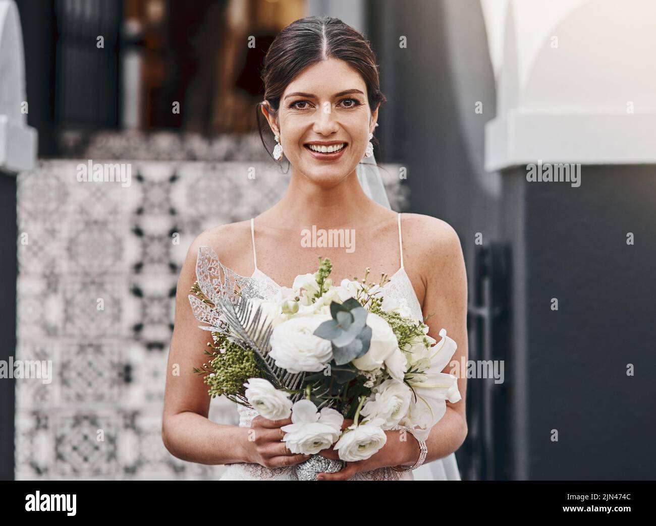 Today Im marrying my soulmate. a beautiful bride standing outside. Stock Photo