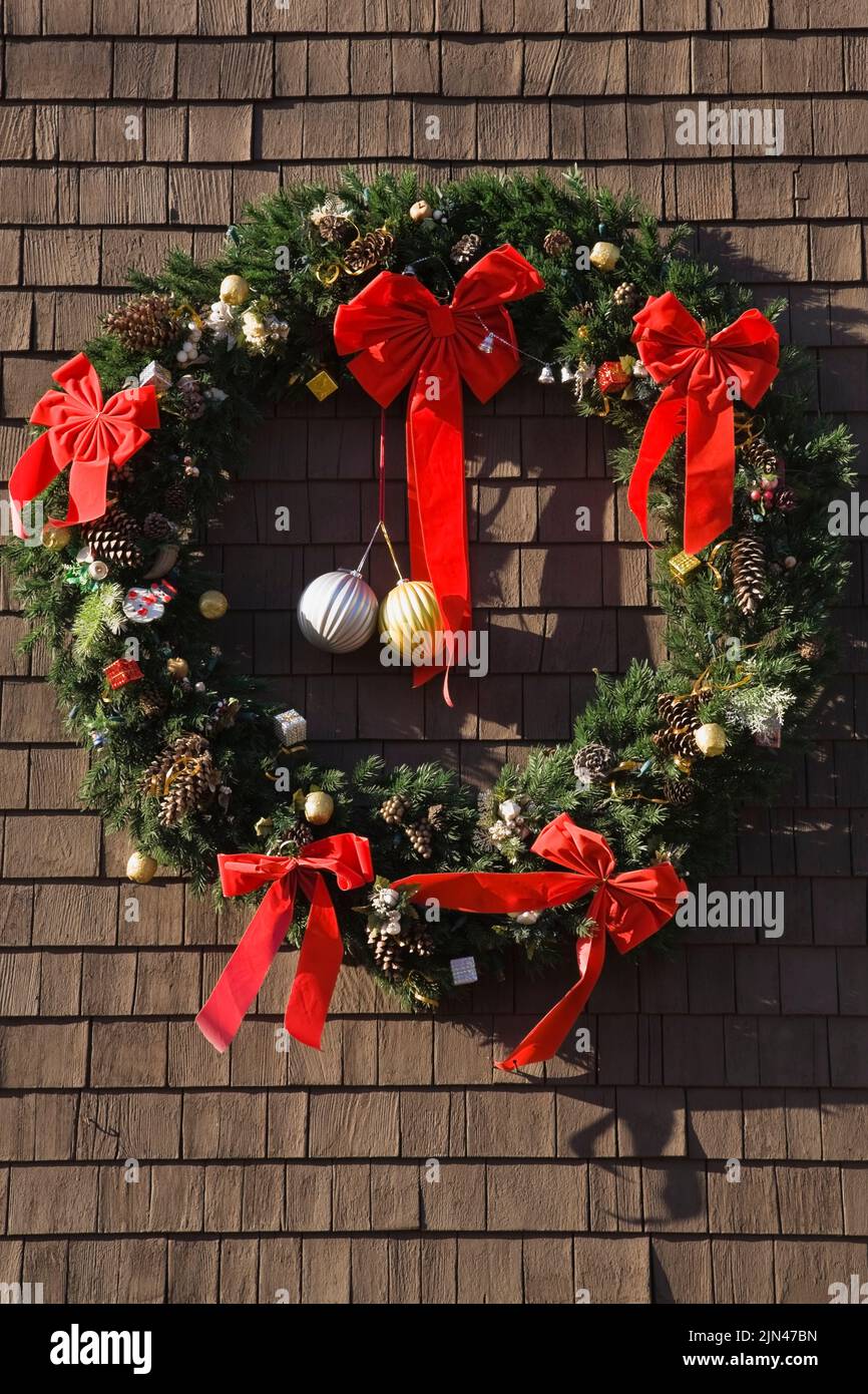 Christmas Wreath on cedar shingles background, Quebec, Canada Stock Photo
