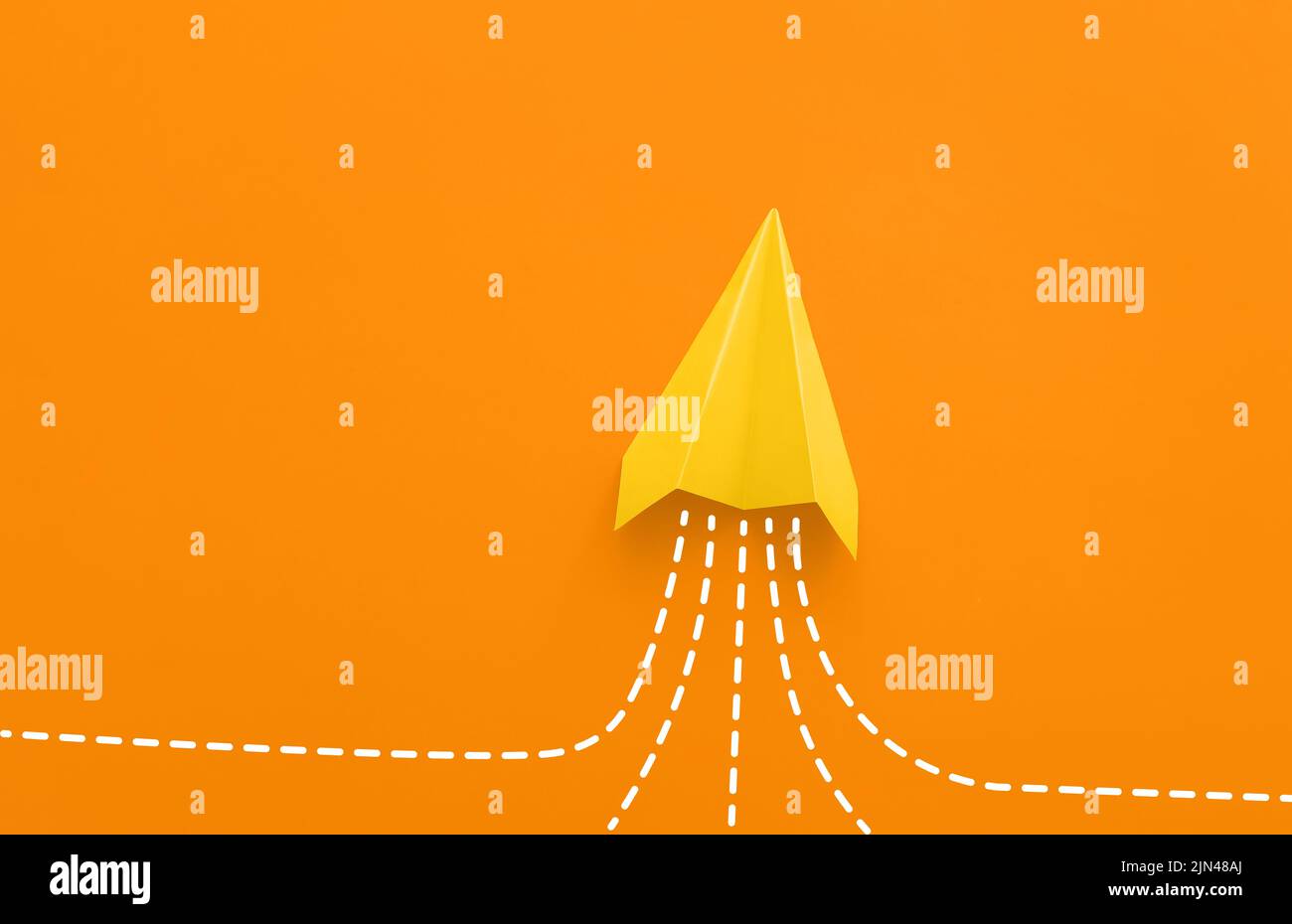 Orange paper plane hi-res stock photography and images - Alamy