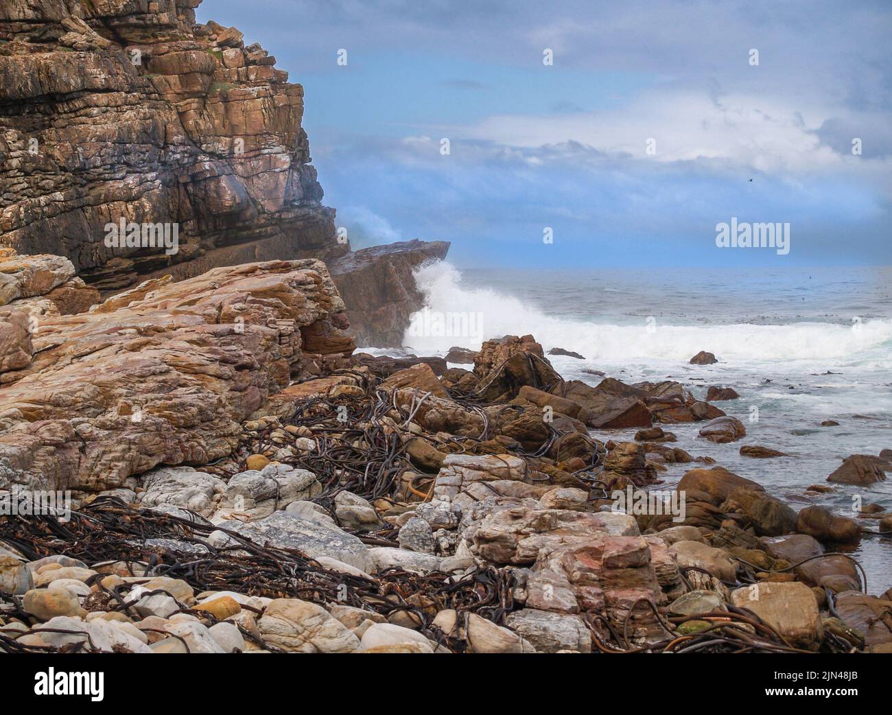 Rocky foreshore and rough seas at Cape Of Good Hope, South Africa. Stock Photo