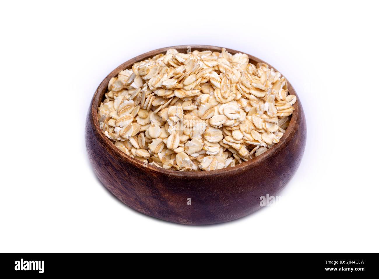 Heap of dry rolled oats isolated Stock Photo