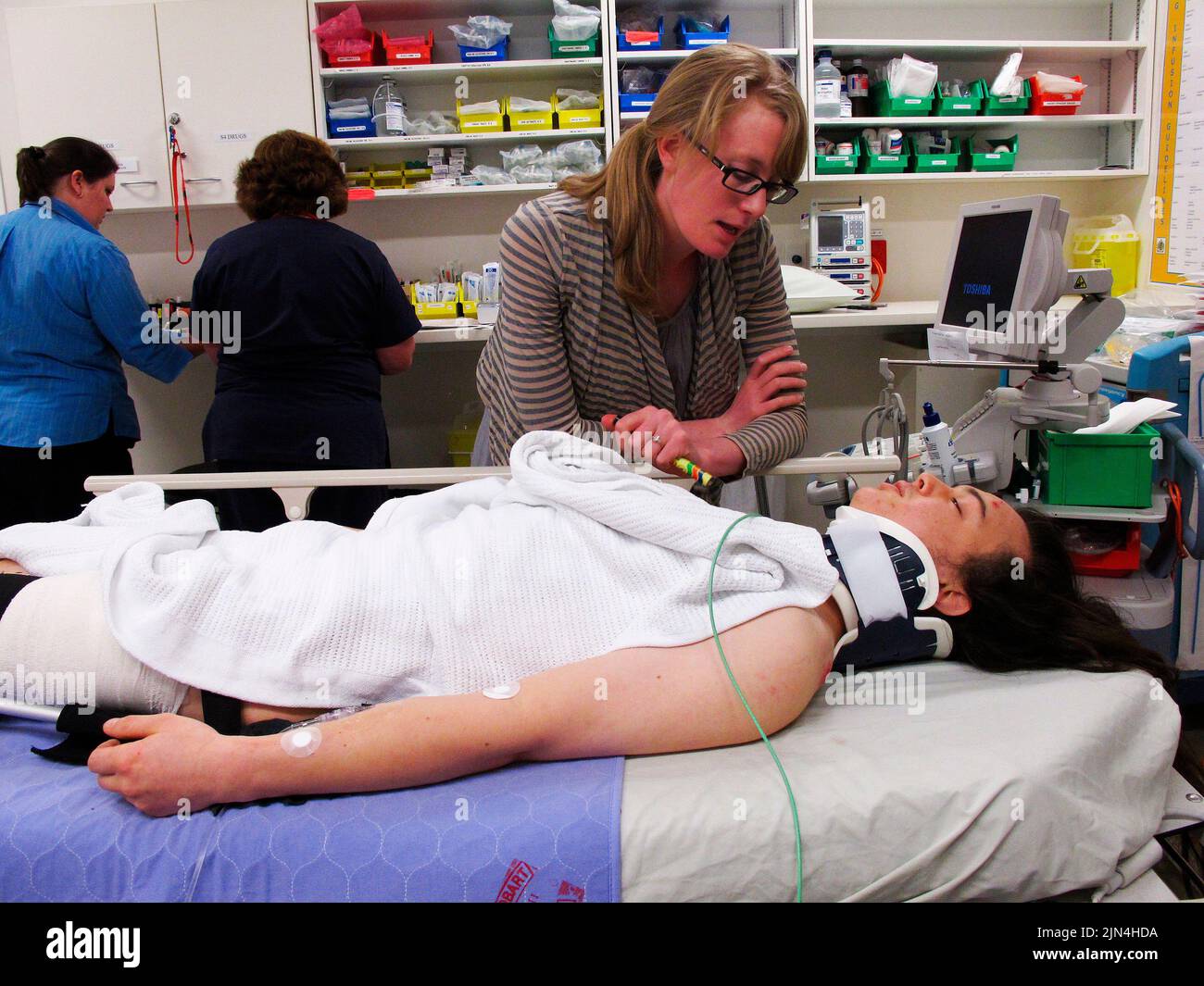 Young man with broken femur due to a cycling accident receives care in the Royal Hobart Hospital accident and emergency department (release available form the victim if required) Stock Photo