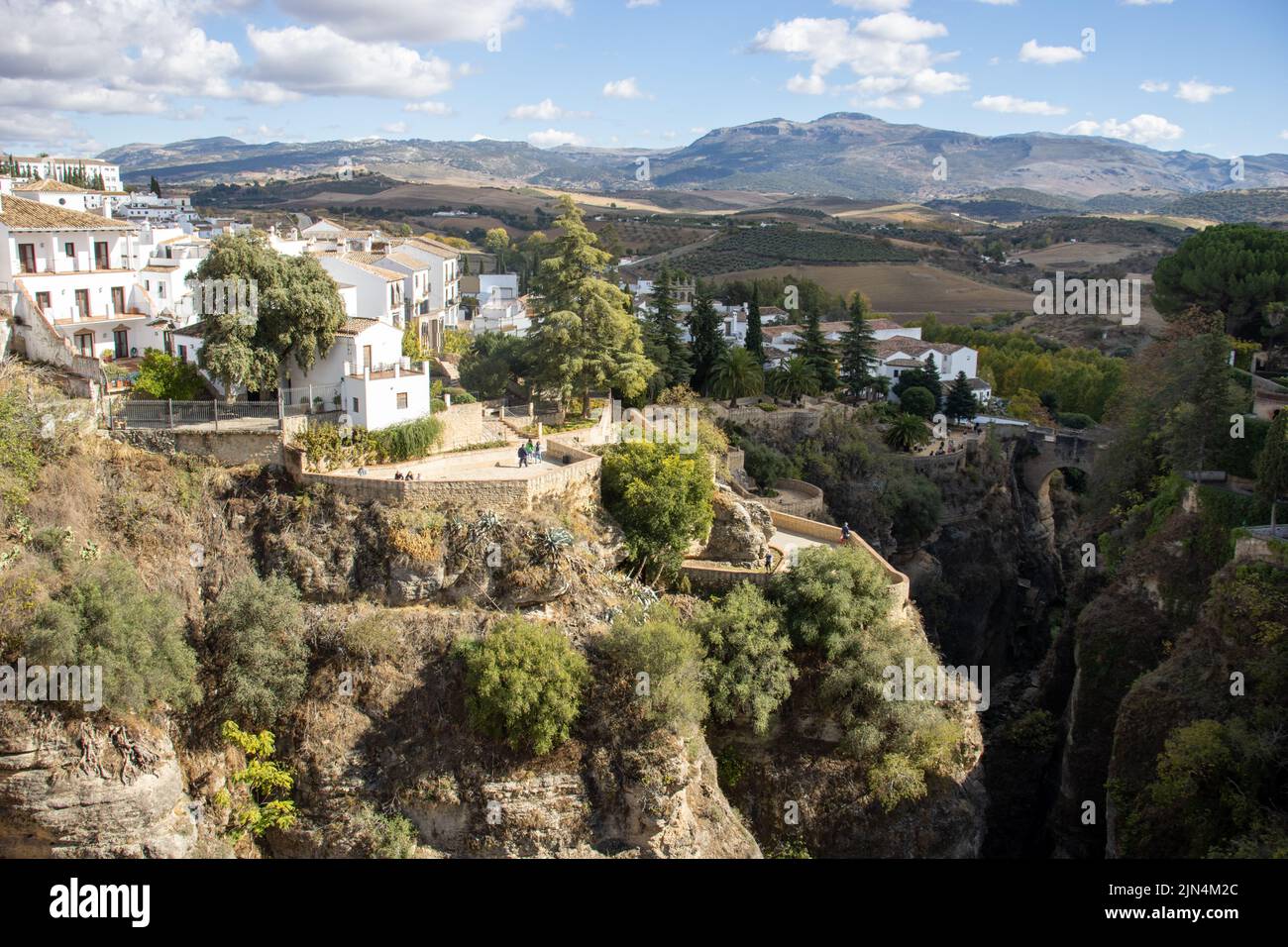 RONDA, ANDALUSIA, SPAIN - NOVEMBER 4,  2021 view of the New Bridge and the cliffs and valley below Stock Photo