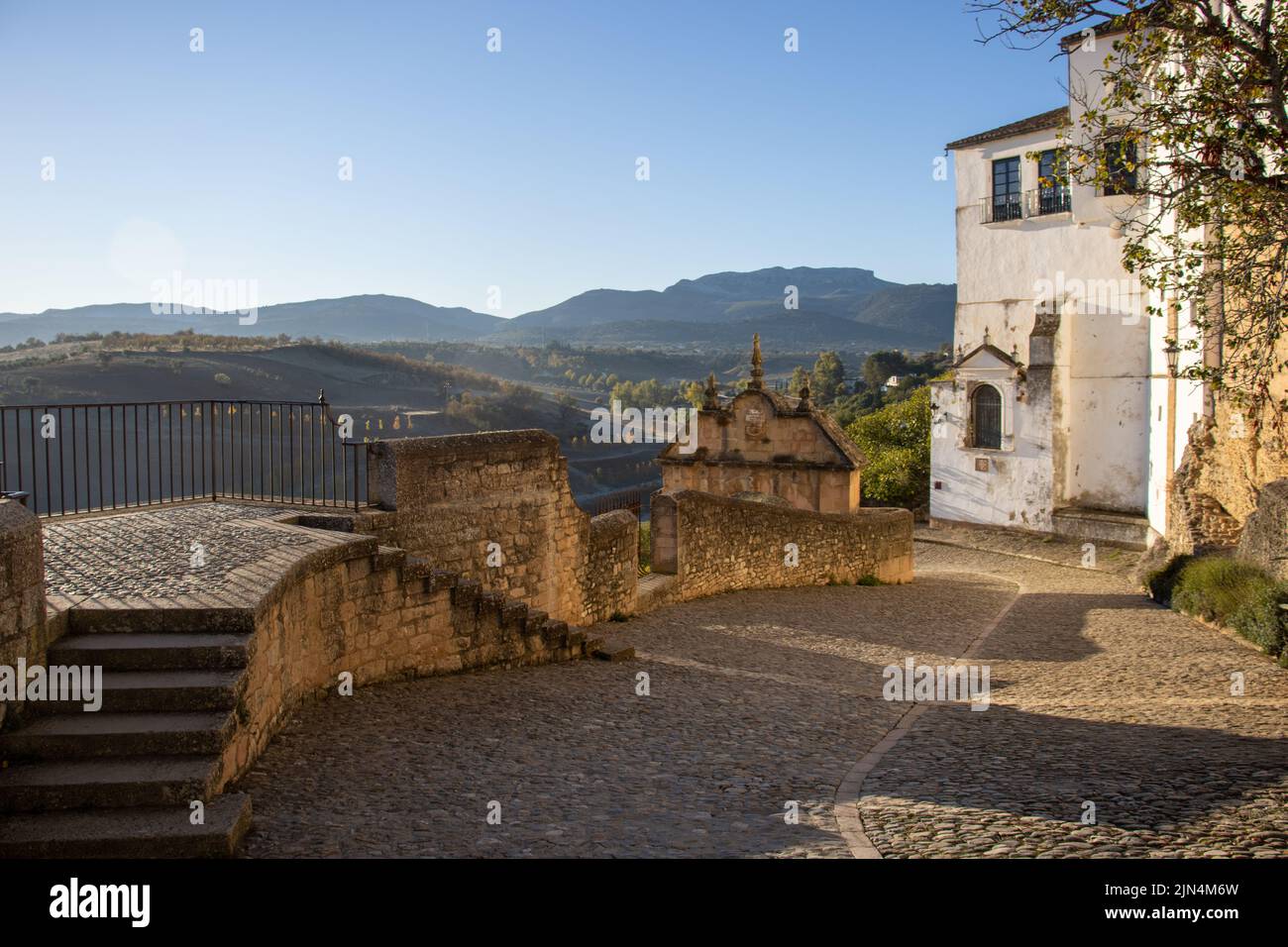 RONDA, ANDALUSIA, SPAIN - NOVEMBER 5,  2021 cobbled path and buildings in the old town Stock Photo