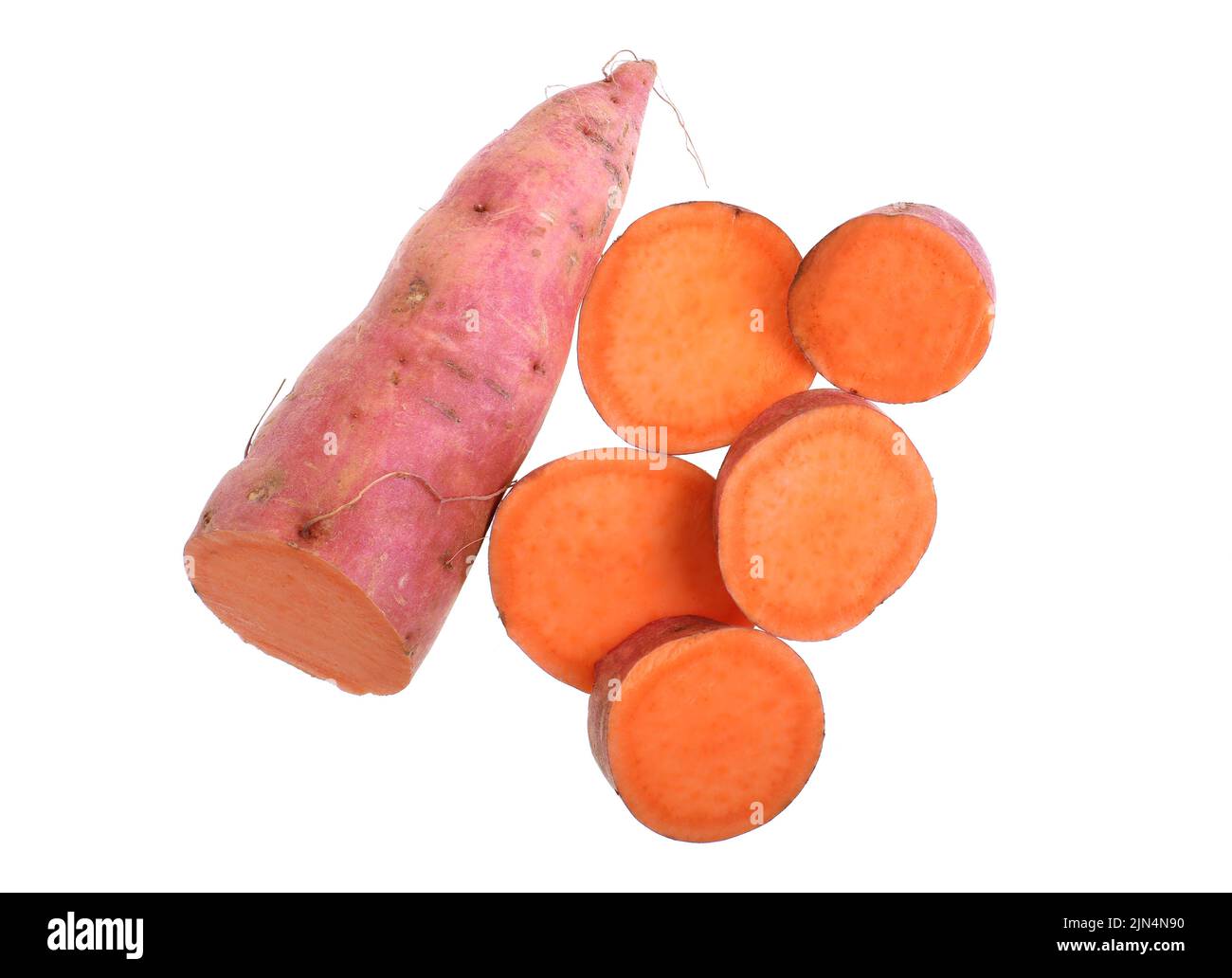Sweet potato, Ipomoea batatas, is a dicotyledonous plant belonging to the bindweed or morning glory family, used in many cuisines around the world. Stock Photo
