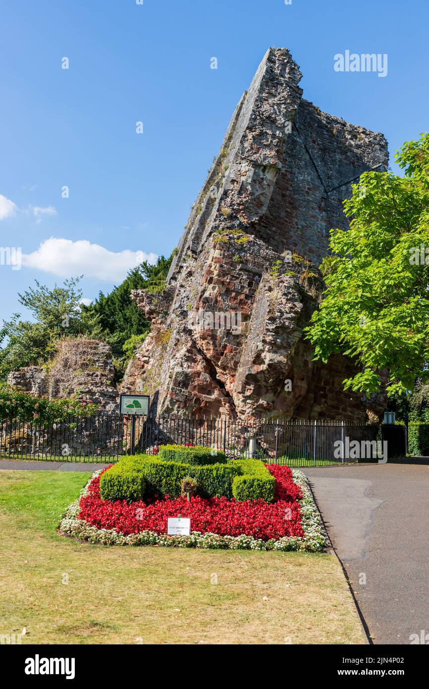 The remains of Bridgnorth Castle and flower display in Shropshire, UK on a beautiful summers day Stock Photo