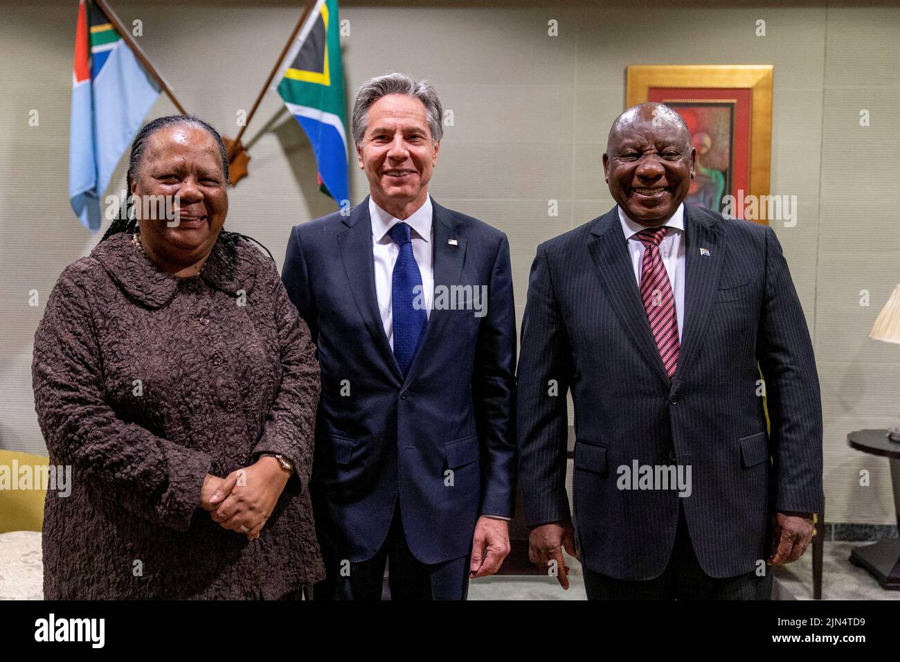 U.S. Secretary of State Antony Blinken, South Africa's President Cyril Ramaphosa and South Africa's Foreign Minister Naledi Pandor pose for a photo as they meet at Waterkloof Airforce Base in Centurion, South Africa, August 9, 2022. Andrew Harnik/Pool via REUTERS Stock Photo
