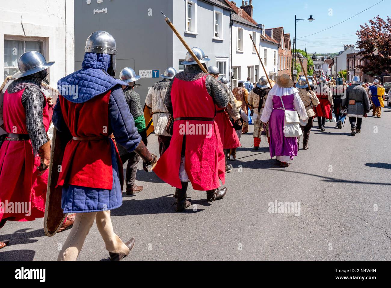Men Dressed In Medieval Costume Prepare To Take Part In A Re-Enactment Of The 13th Century Battle Of Lewes , Lewes, East Sussex, UK. Stock Photo