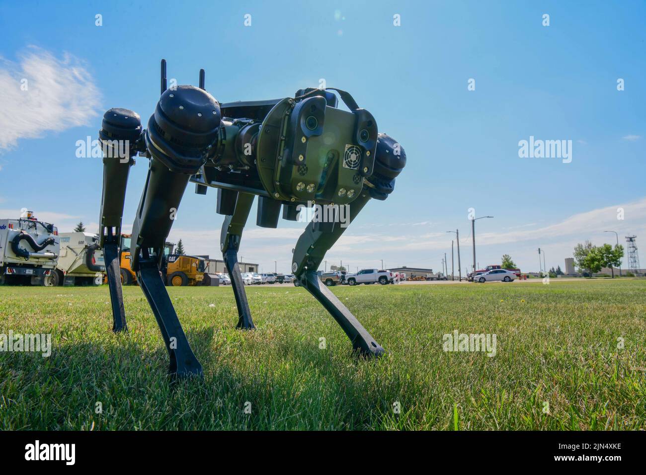 Minot, North Dakota, USA. 14th July, 2022. Members of the 5th Civil Engineer Squadron Chemical, Biological, Radiological and Nuclear team (CBRN) train on the new Vision 60 'Robot Dog' on Minot Air Force Base, North Dakota, June 14, 2022. The Robot Dog is used to replace warfighters, workers and military working dogs in certain situations to keep our Airmen safe. Credit: U.S. Air Force/ZUMA Press Wire Service/ZUMAPRESS.com/Alamy Live News Stock Photo
