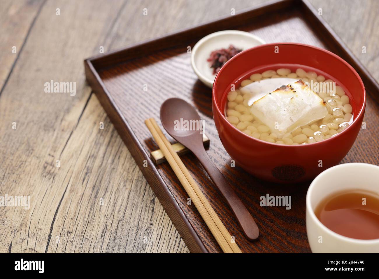 white adzuki Zenzai ( sweet beans soup with baked rice cake), a Japanese dessert Stock Photo
