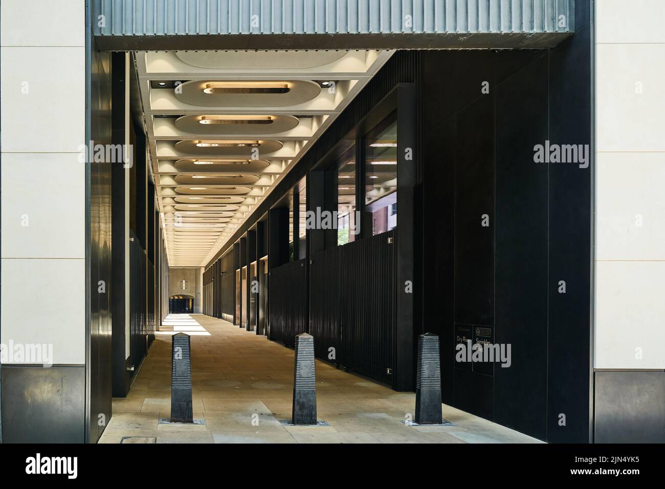 Passageway to the courtyard in a new commercial building, Hanover Square, London, England. Stock Photo