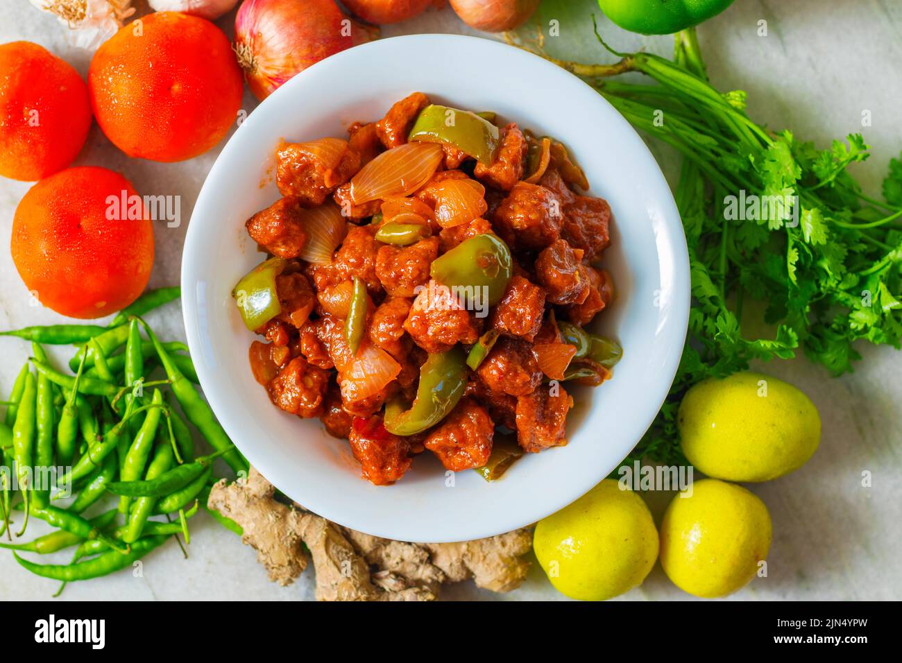 selective focus of Soya Manchurian/Chili Soya bean chunks recipe. with a decorative background. Stock Photo