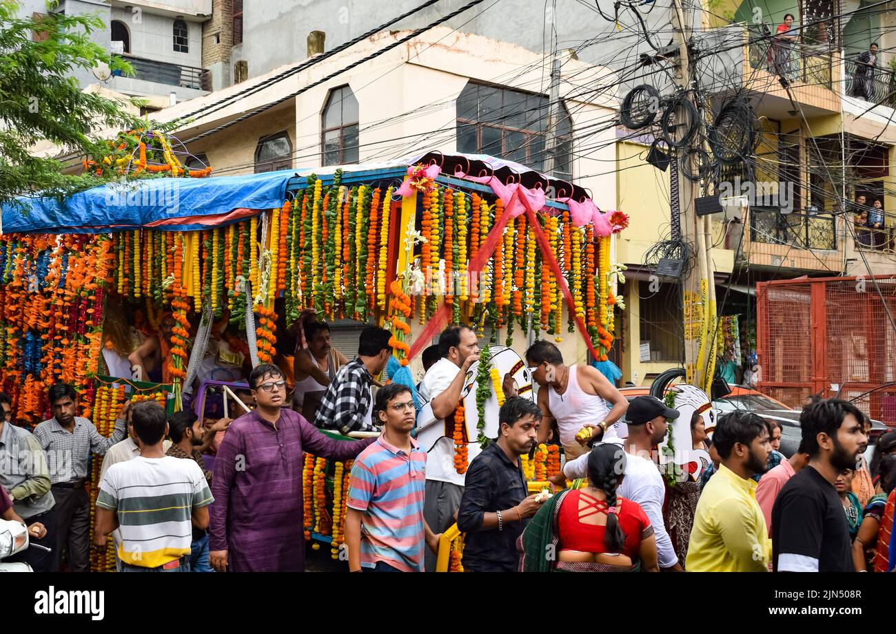 New Delhi, India July 01 2022 - A huge gathering of devotees from different parts of Delhi on the occasion of ratha yatra or rathyatra. Rath for Lord Stock Photo