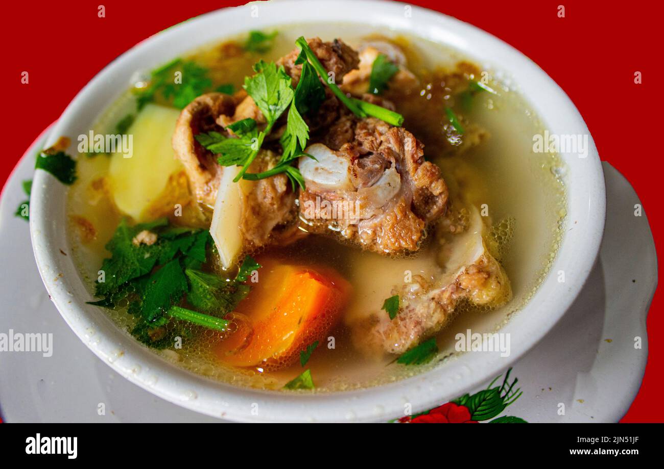sop buntut or oxtail soup or tail soup is traditional soup made from tail ox, Boiled with Spices Stock Photo