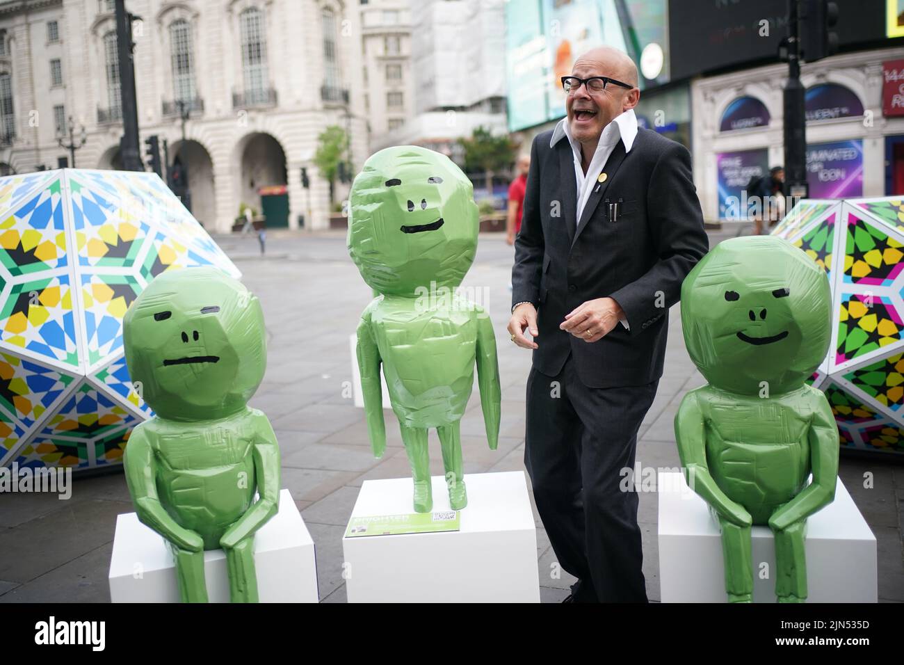 Harry Hill during the launch of the 'Brighter Future' art initiative, at Piccadilly Circus, London. The initiative, developed by Art of London and the National Gallery X, aims to bring art to the streets of the West End. Picture date: Tuesday August 9, 2022. Stock Photo