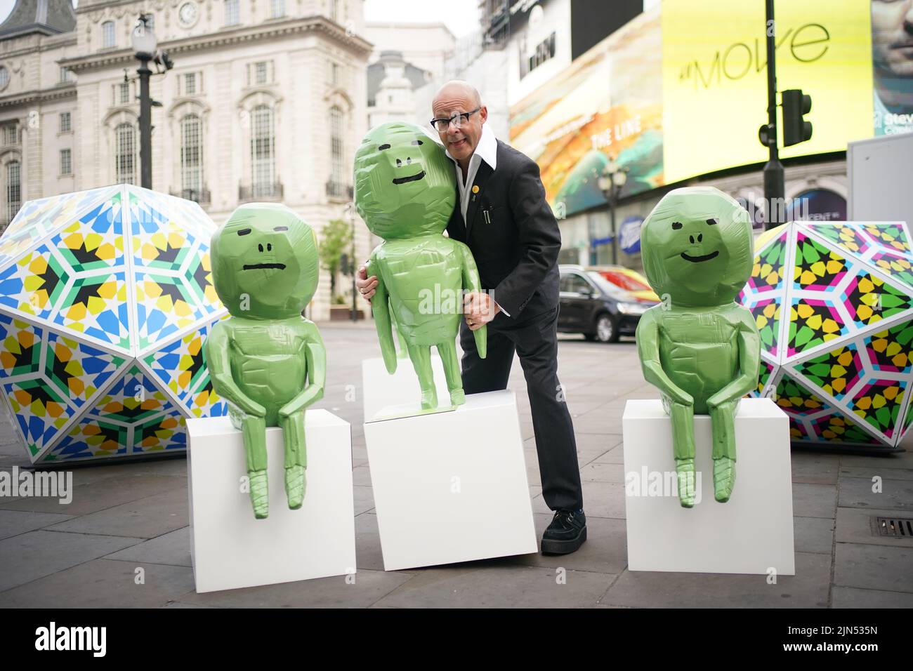 Harry Hill during the launch of the 'Brighter Future' art initiative, at Piccadilly Circus, London. The initiative, developed by Art of London and the National Gallery X, aims to bring art to the streets of the West End. Picture date: Tuesday August 9, 2022. Stock Photo