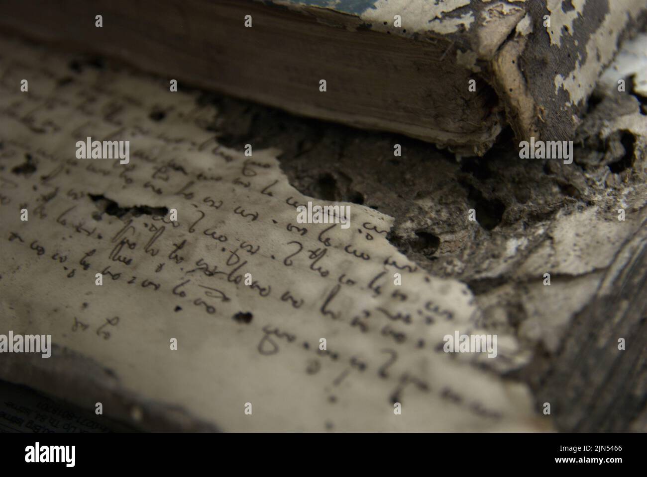 A book written in ancient letters is being reconstructed at the National Library in Jakarta, Indonesia. Stock Photo