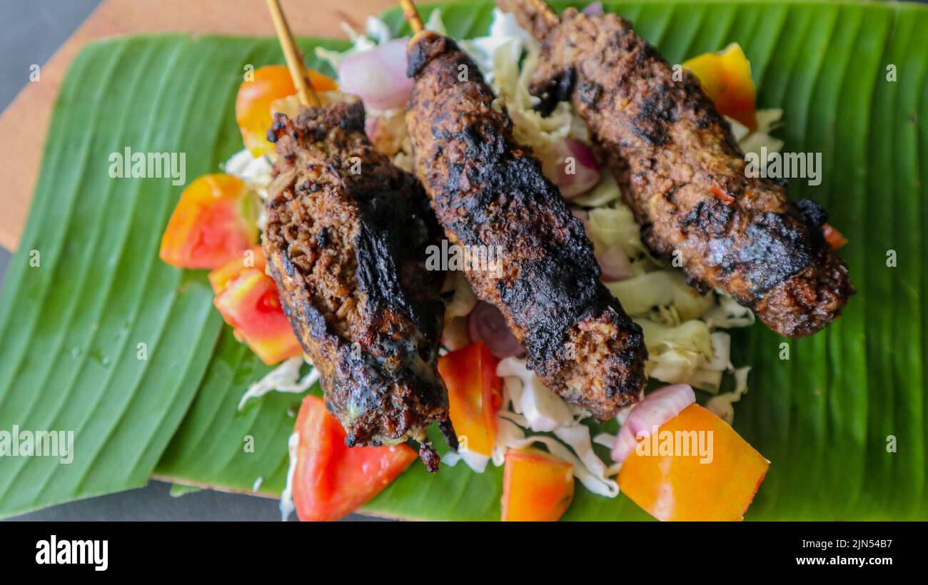 sate buntel or satay buntel is satay made from minced mutton wrapped in ...