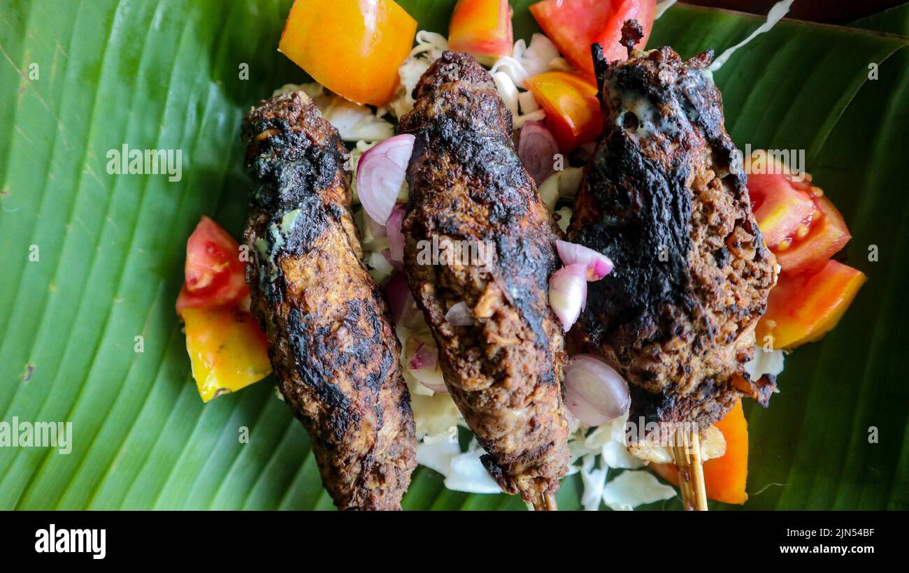 sate buntel or satay buntel is satay made from minced mutton wrapped in ...