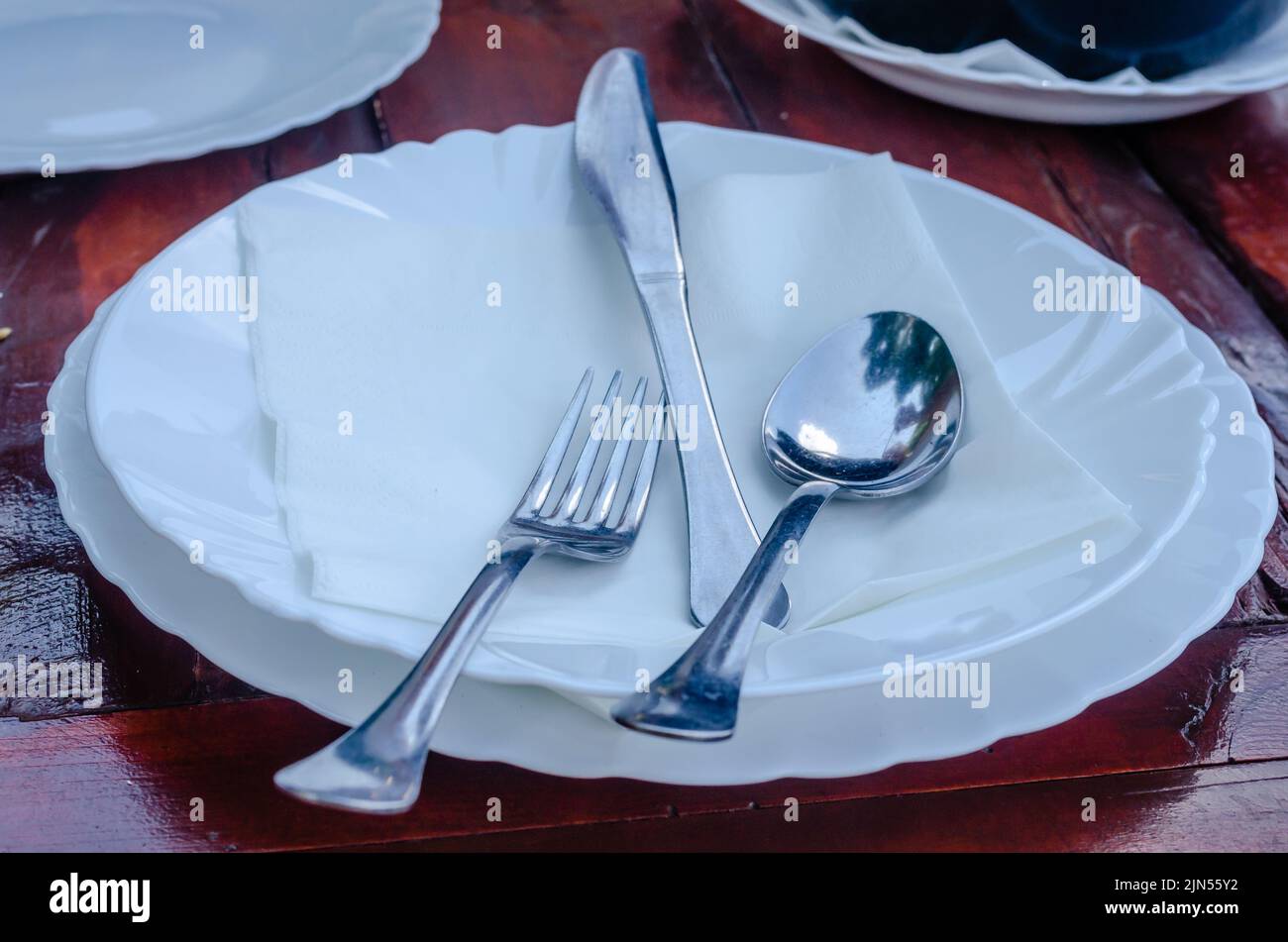 Utensils for dining in a restaurant. Placed utensils for dining in the