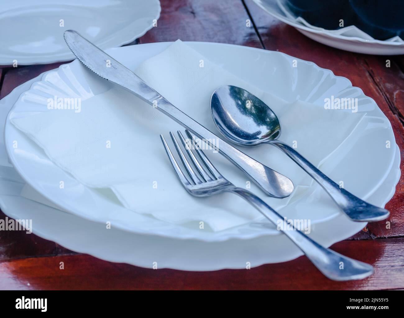 Utensils for dining in a restaurant. Placed utensils for dining in the