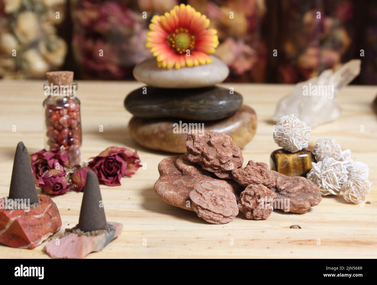Incense Cones and Desert Rose Rocks on Meditation Table With Pyramid in ...