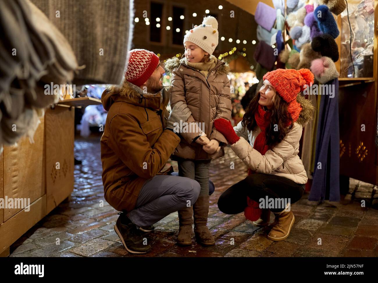 happy family at christmas market in city Stock Photo