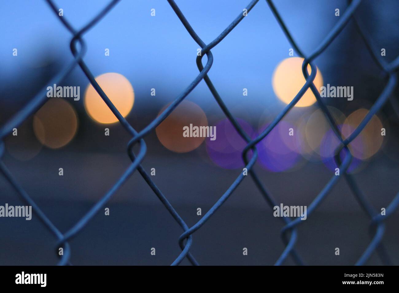 A closeup shot of a fence on a blurry background Stock Photo - Alamy