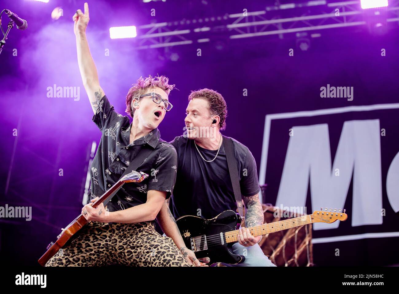 Tom Fletcher and Danny Jones of McFly play guitars together on stage