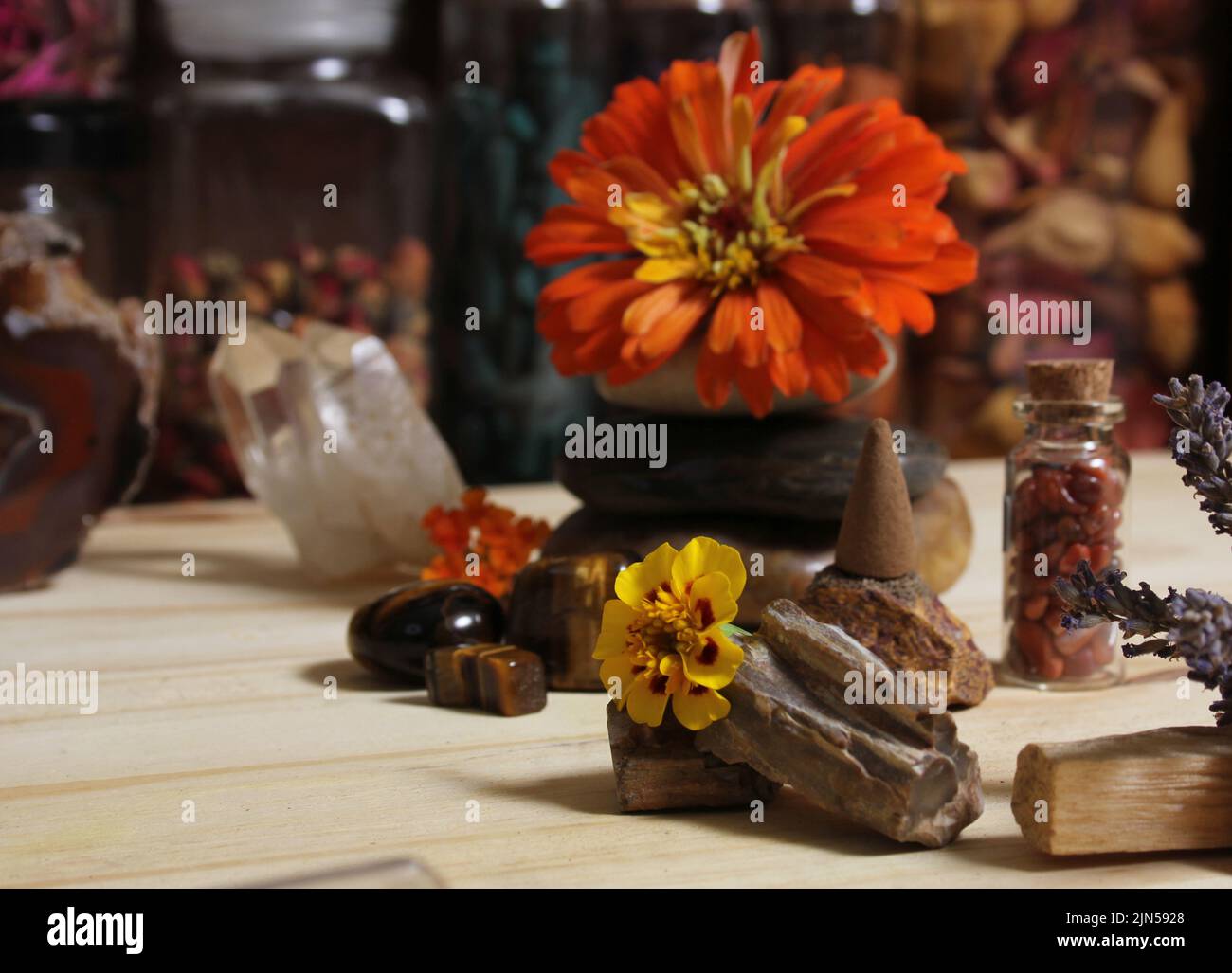 Flowers and Incense Cone With Palo Santo Sticks on Meditation Altar
