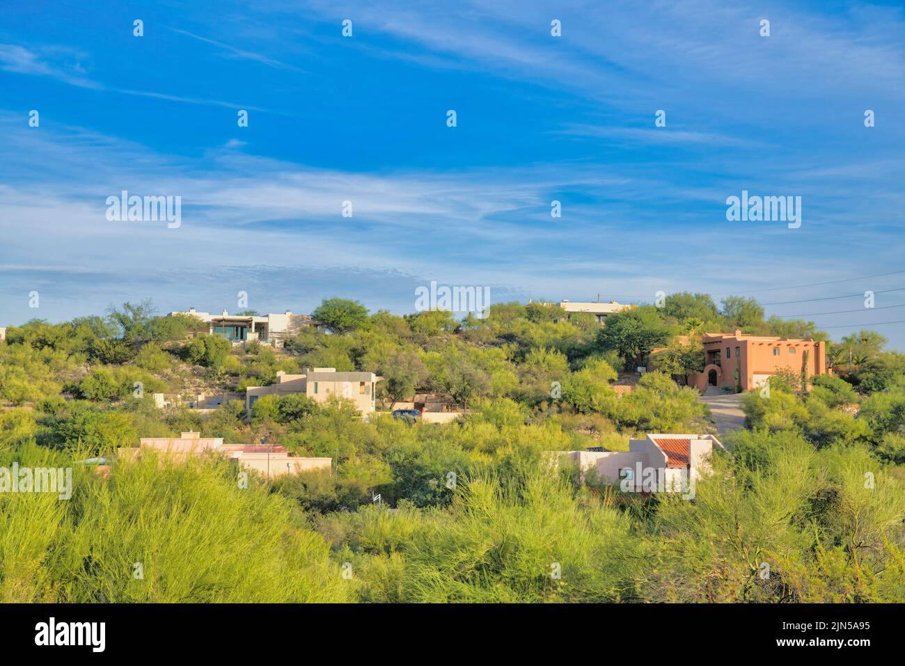 Sloped neighborhood with mediterranean houses in Tucson, Arizona. There