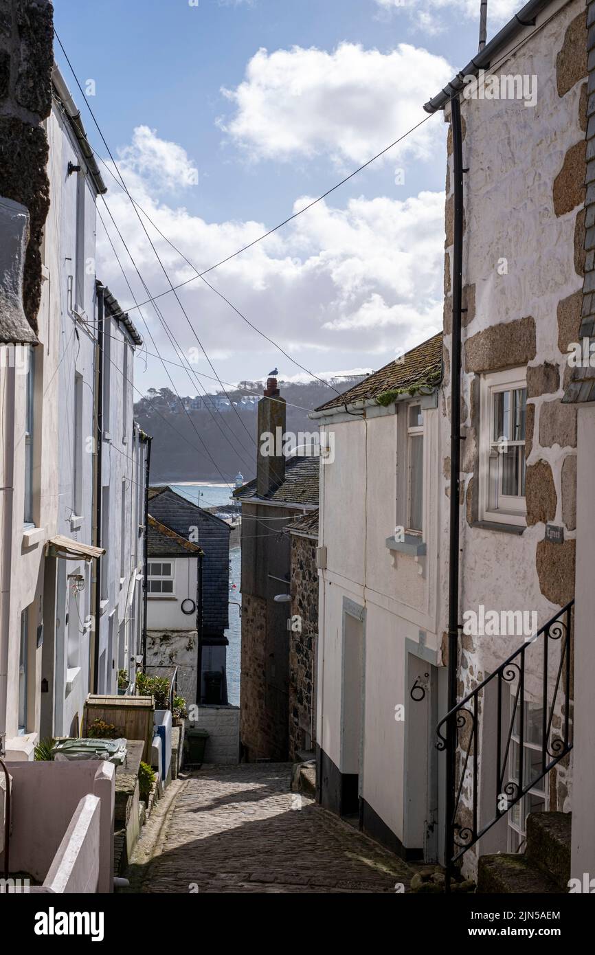 Narrow street view between old cottages, St Ives, Cornwall Stock Photo
