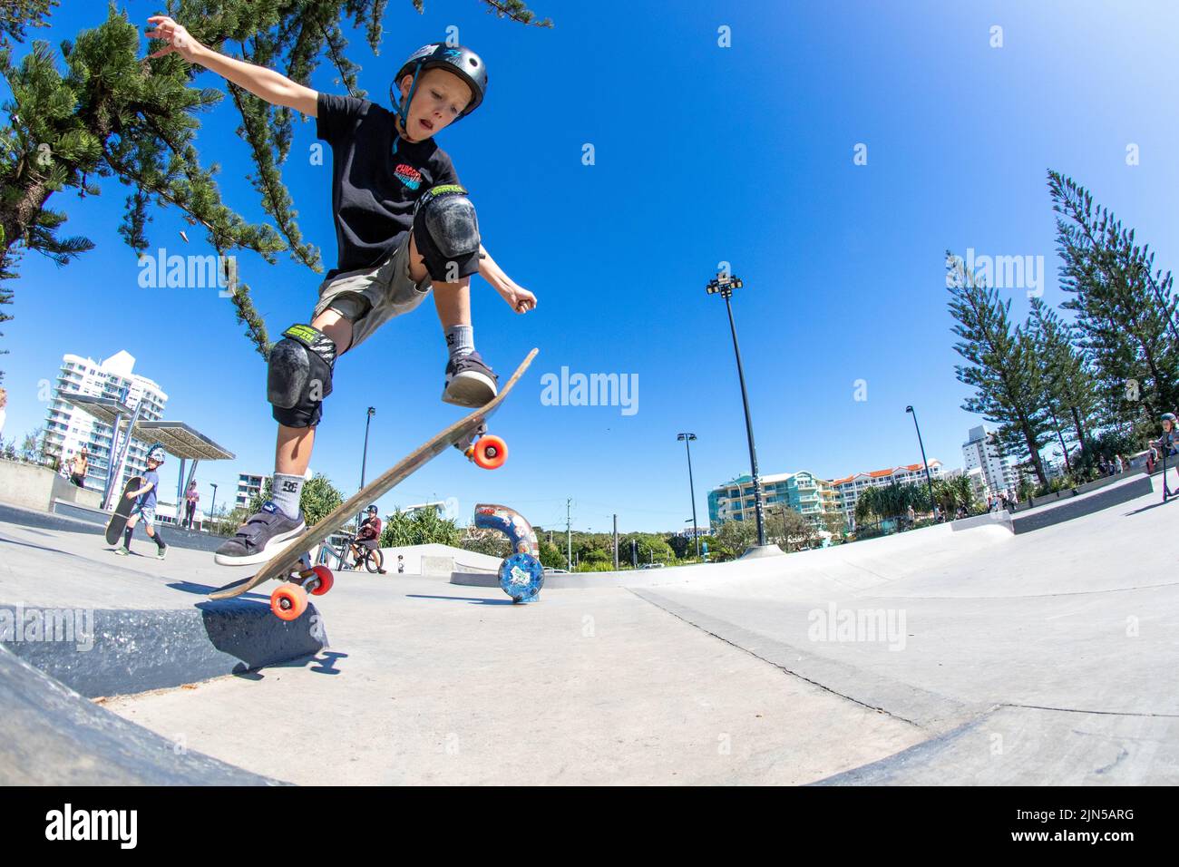 The young skater in Alexandra headland skatepark. Maroochydore, Australia. Stock Photo
