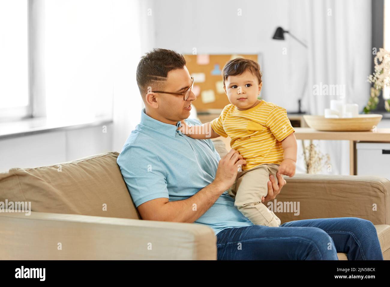 happy father with little baby son at home Stock Photo