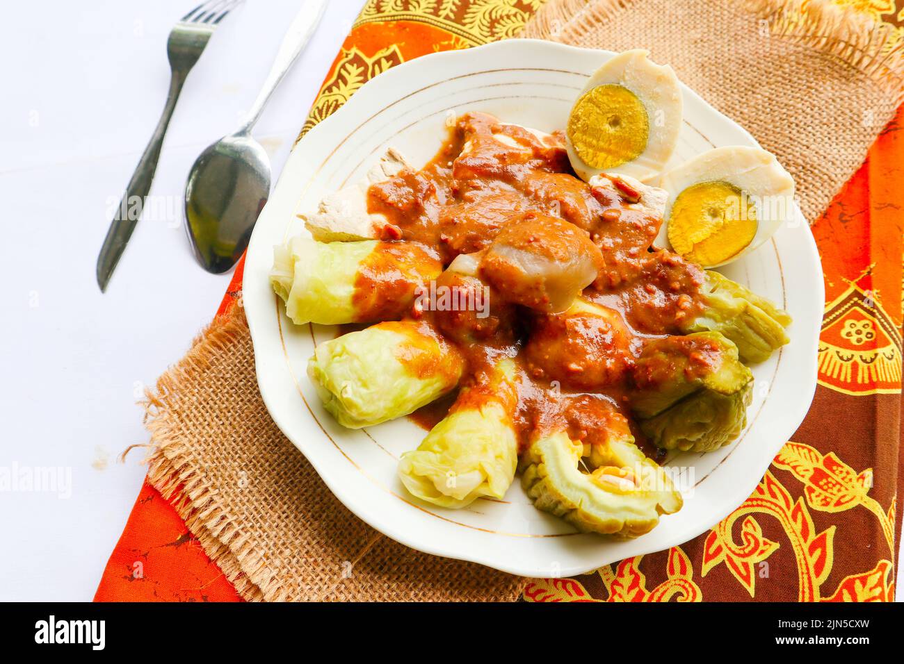 siomay or dumplings is traditional indonesian china food with peanut