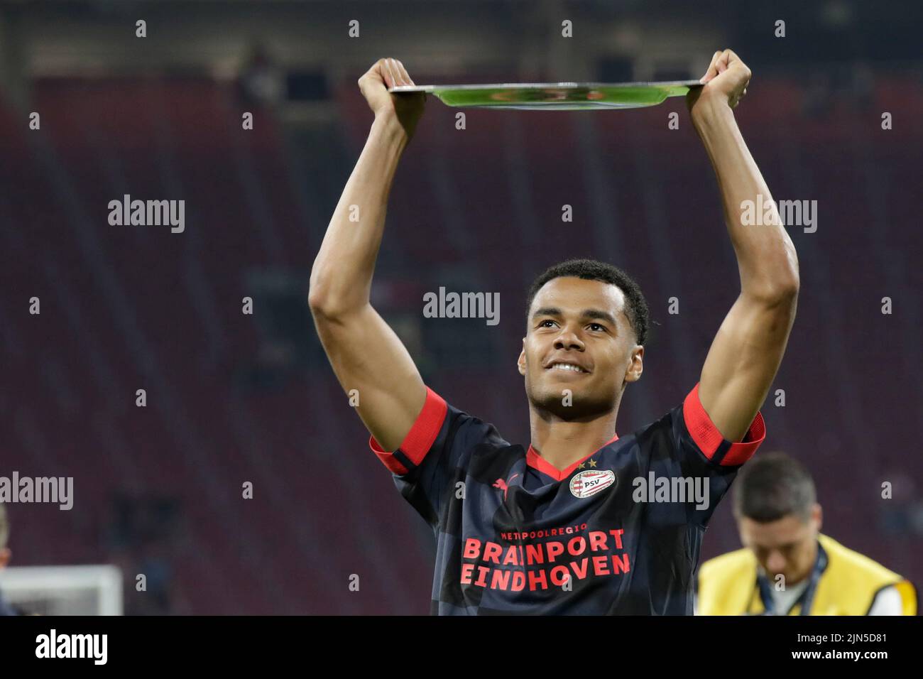 AMSTERDAM, THE NETHERLANDS JULY 30 Cody Gakpo of PSV holding the trophy during the Johan